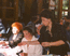 Russian Dinner-2001.  Ludmila Zueva seves the guests