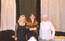 Natalia Antipova, Anastasia Vdovina and Gita Rappoport near Showl exhibition
